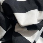 MANTEL REDONDO 126'' RAYAS NEGRAS SEVILLA