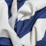 MANTEL REDONDO 126'' RAYAS AZULES SEVILLA