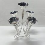 CENTRO DE MESA EN NICKEL PLATED TROMPETA